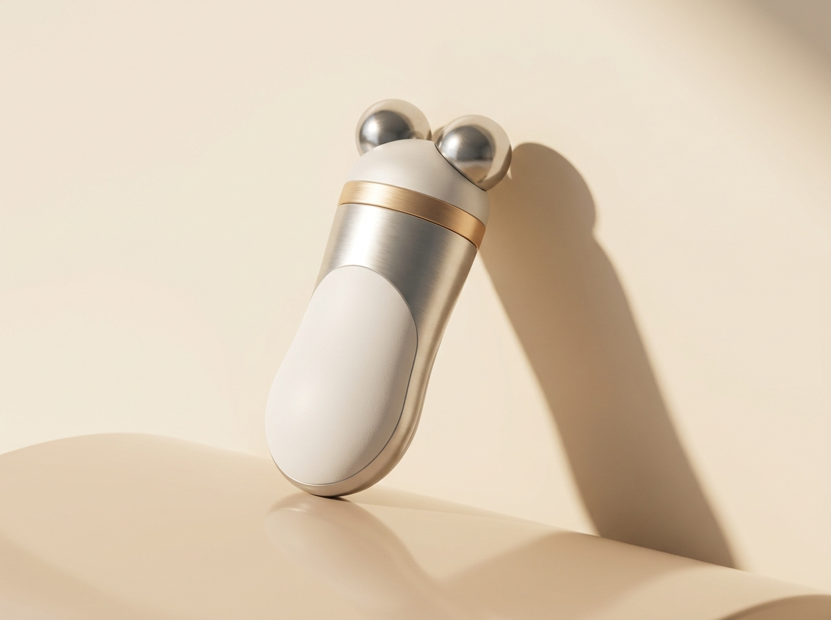 Visage microcurrent facial-toning device with twin metal spheres
